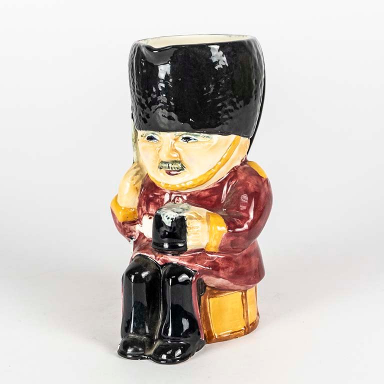 Lote siguiente: Jarra de vino cerámica inglesa Staffordshire con guardia