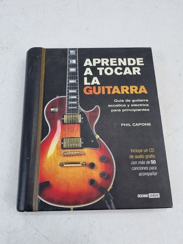 Aprende a Tocar la Guitarra: Guía Práctica para Principiantes de Phil Capone con CD