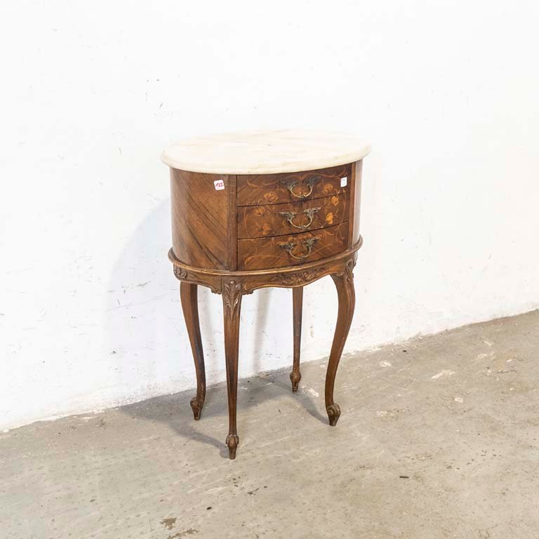 Lote anterior: Comodín Luis XV con marqueterie floral y tapa de mármol oval