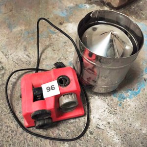 Lote anterior: Equipo Eléctrico Rojo con Pieza Metálica Cilíndrica