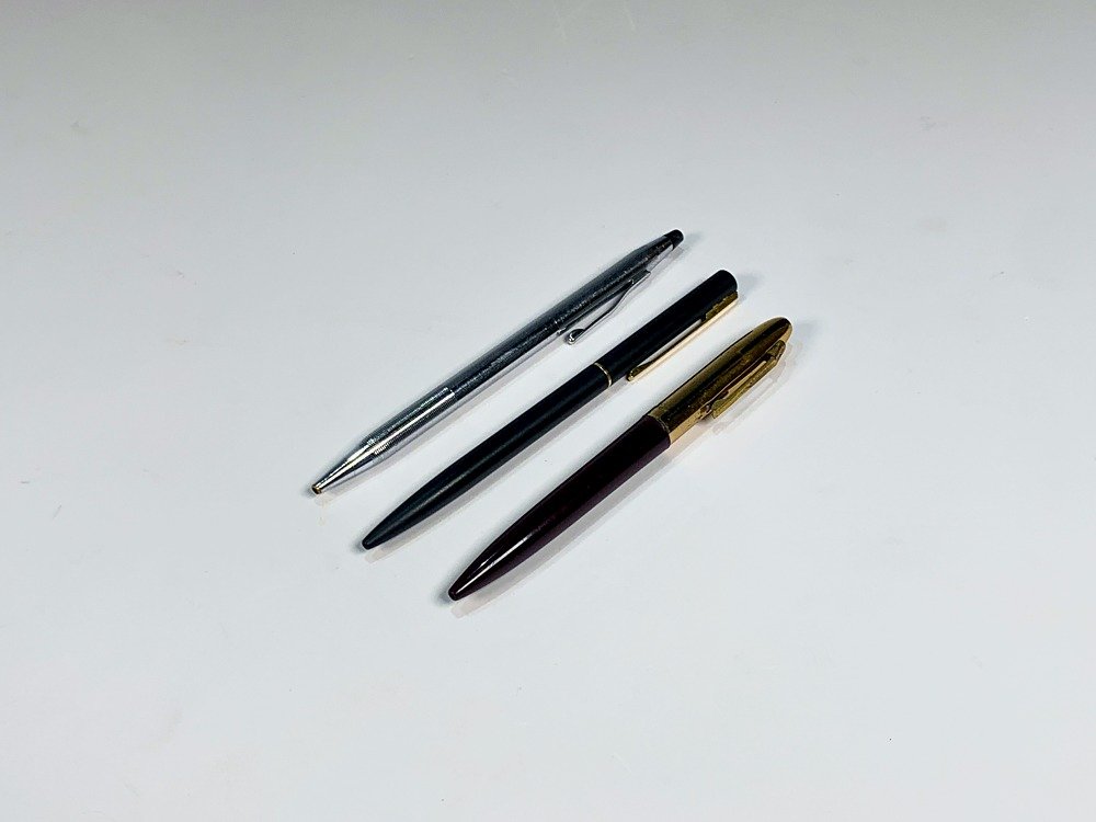 Tres Bolígrafos: Lebaron Negro, Cross Plateado y Marrón Dorado