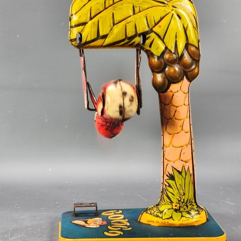 Juguetes antiguos de metal y madera, con detalles de palmeras y aves - imagen 7