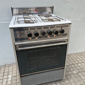Lote anterior: Cocina a Gas Combinada Delne Blanca con Hornallas Eléctricas