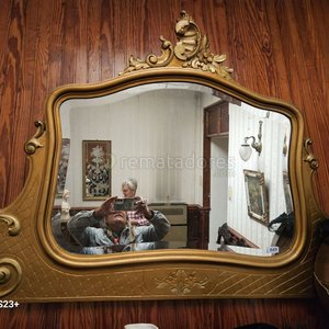 Lote anterior: Espejo antiguo con marco dorado ornamentado