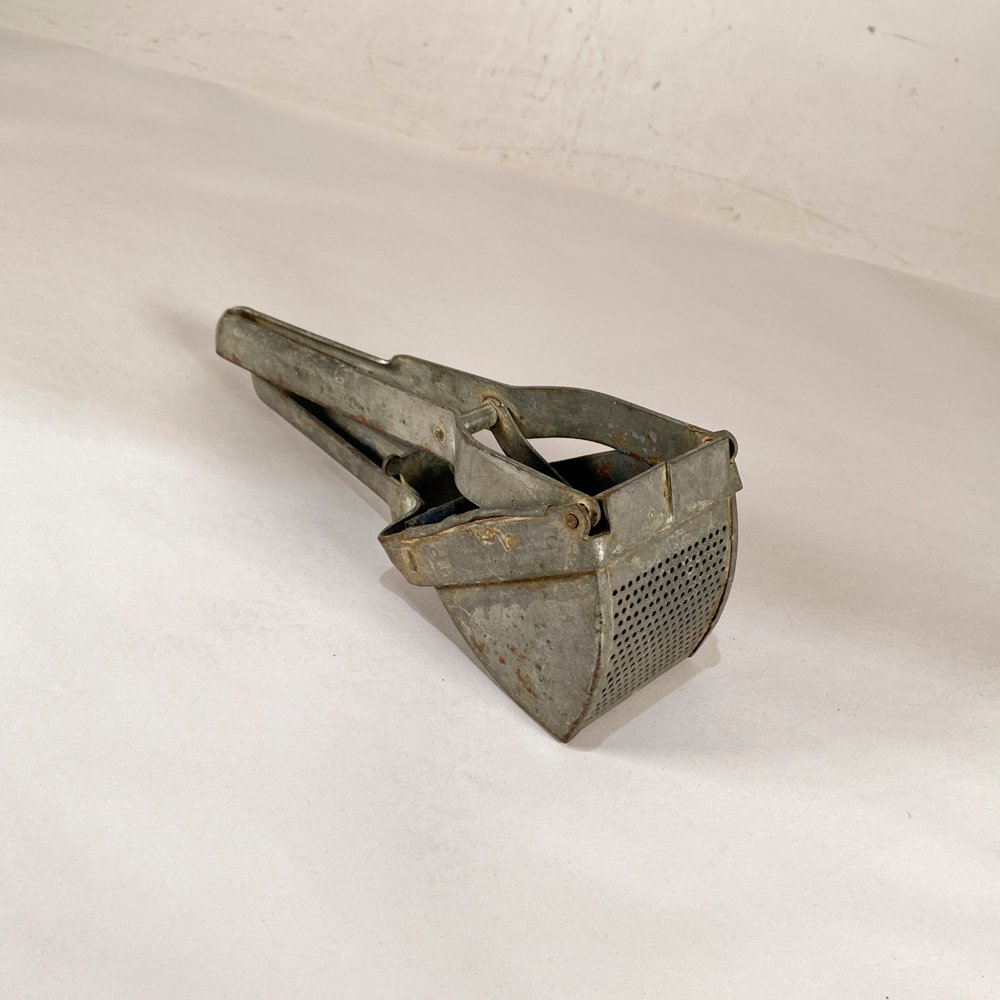 Antiguo Pelapapas de Metal Vintage