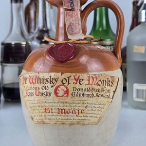 Lote de Botellas de Bebidas Alcohólicas Variadas: Empezadas y Vacías - imagen 10