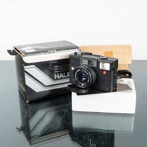 Lote siguiente: Cámara Halina 35mm con Funda y Caja Original