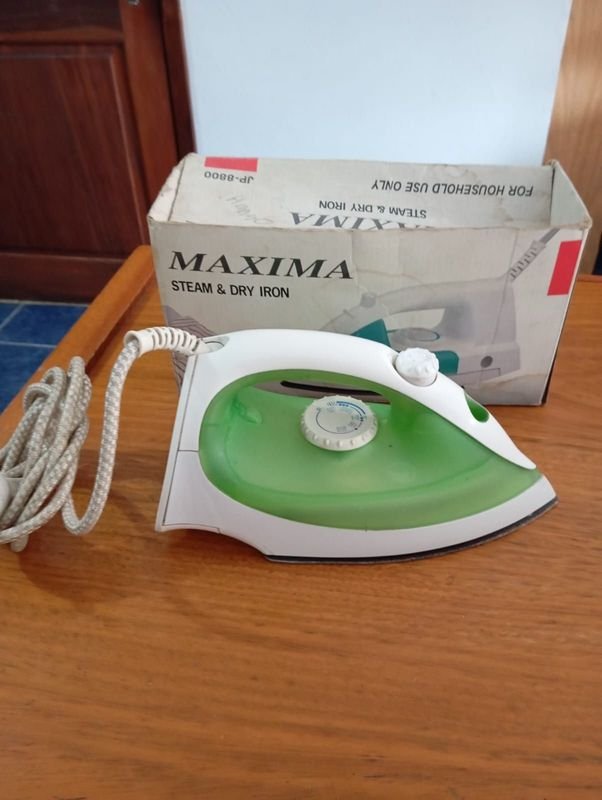 Plancha eléctrica a vapor Maxima usada