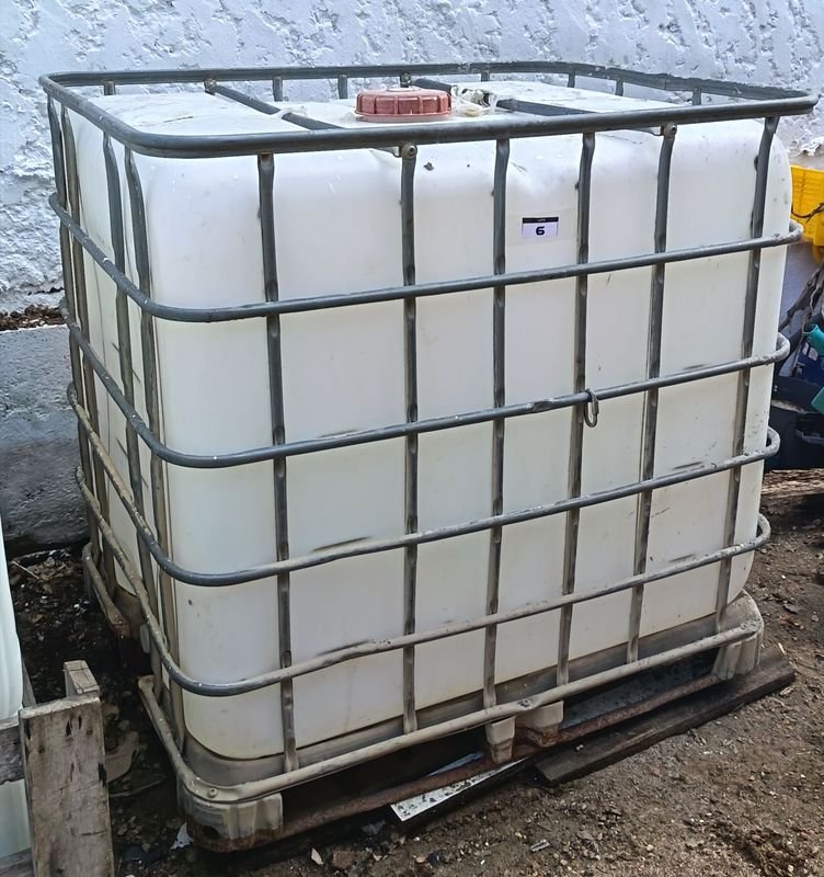 Tanque Contnedort IBC 1000 lts. con Jaula Metálica y Palé