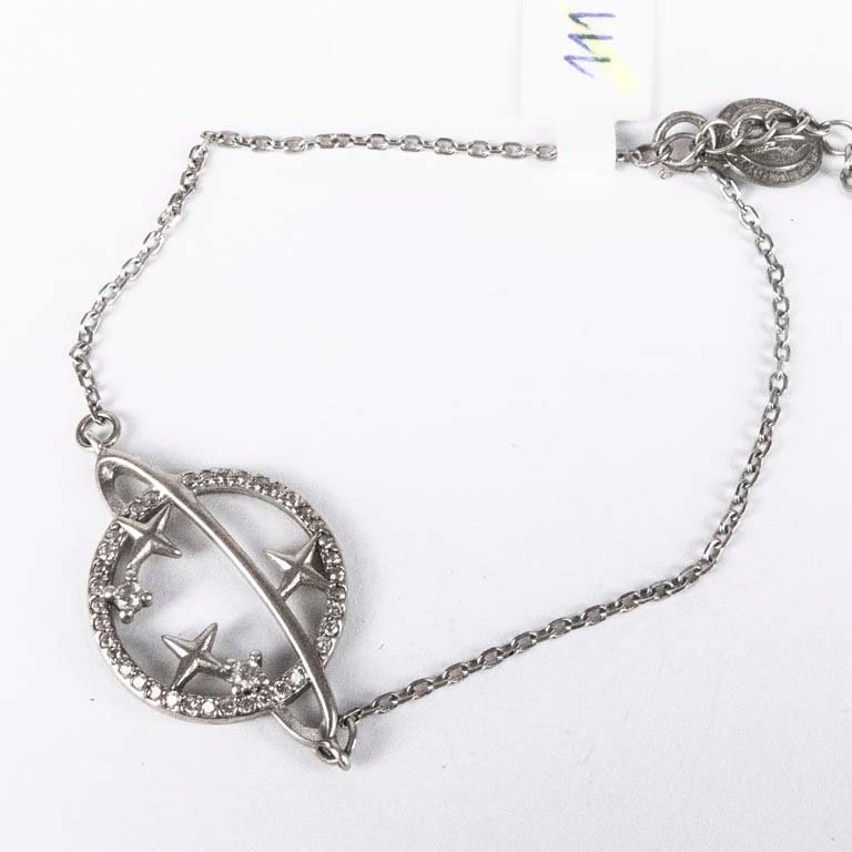 Pulsera de Plata con Diseño de Planeta y Estrellas