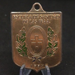 Lote siguiente: Medalla Escuela de Sanidad Fuerzas Armadas Uruguay 1997