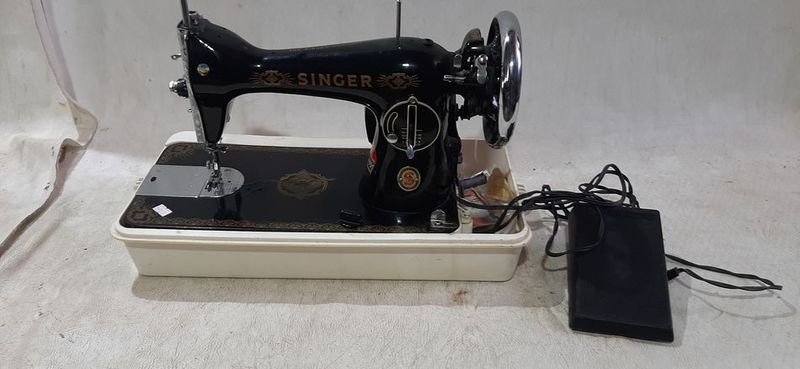 Lote anterior: Máquina de coser eléctrica Singer