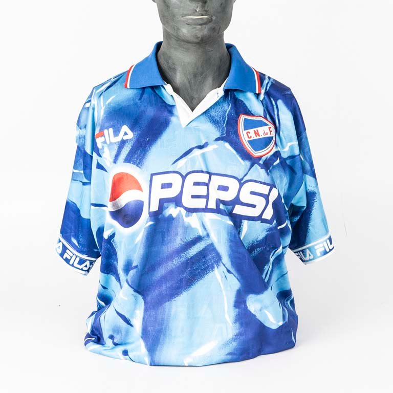 Lote siguiente: Camiseta de Nacional oficial de tienda marca FILA sin número segunda equipación de los años 1999/2000