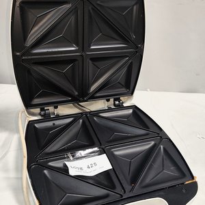 Lote anterior: Sandwichera Cuori para 4 sándwiches, usada