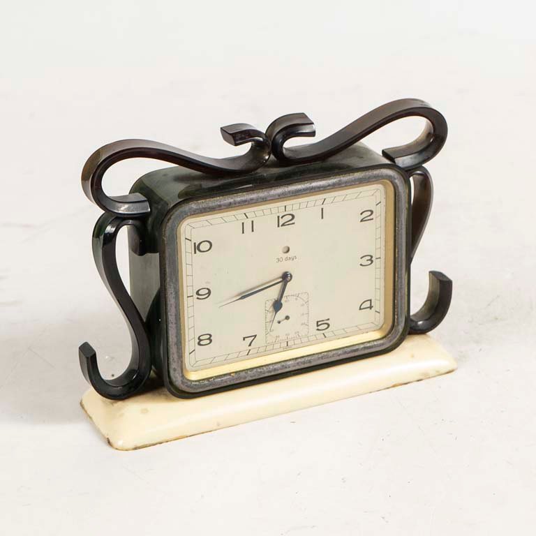 Lote siguiente: Reloj sobremesa de metal y plástico, sin pruebas