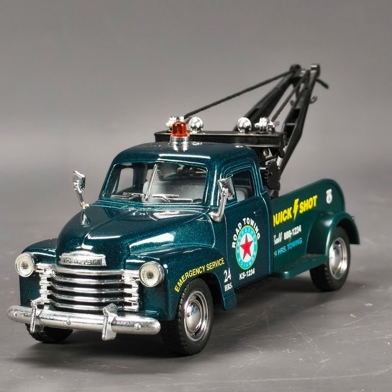 Lote siguiente: Guinche Chevrolet KINSMART a fricción, escala 1/43 en metal