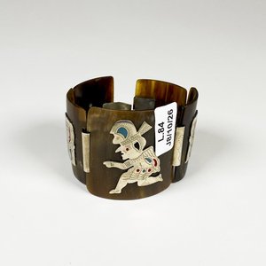Lote siguiente: Brazalete de Guampa con Diseños Mexicanos en Metal y Turquesa