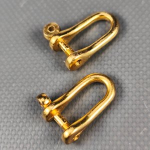 Par de Gemelos Dorados Diseño Grilletes con Estuche - imagen 3