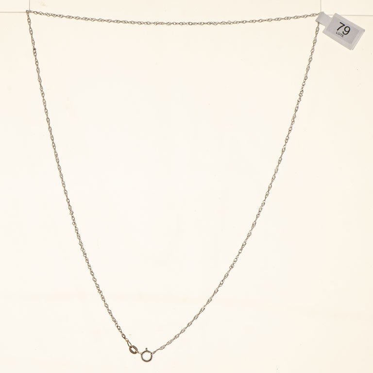 Lote siguiente: Cadena de oro 18k con anillo