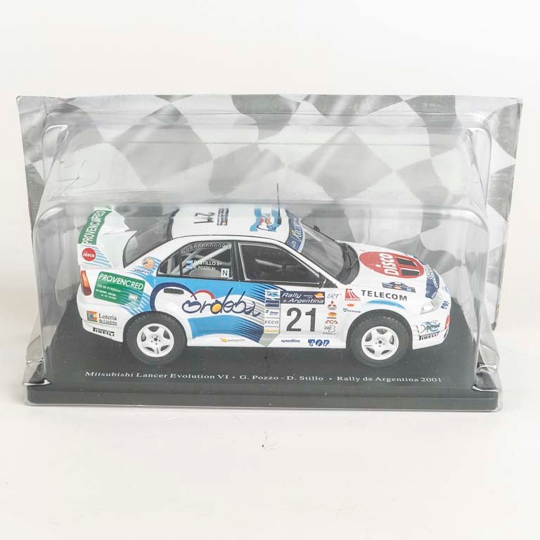 Auto Mitsubishi Lancer Evolution VI G. Pozz - D. Stillo Rally de Argentina 2001 escala 1/24 en su estuche original.