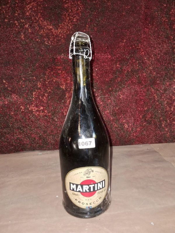 Lote anterior: Botella de Martini Prosecco antigua