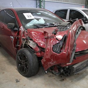 Lote anterior: Auto Rojo con Daños Frontales y Laterales