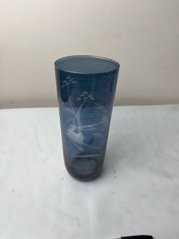 Lote anterior: Florero de vidrio transparente con diseño floral