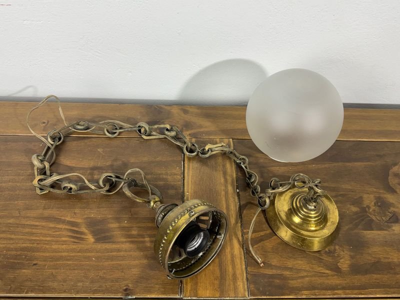 Lote anterior: Colgante circular en bronce con cadena larga