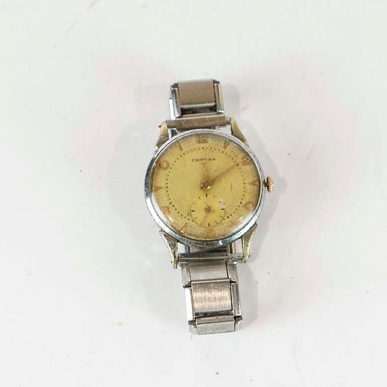 Lote anterior: Reloj de plata con cara de oro