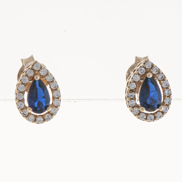 Lote anterior: Pare de aretes de oro con circonias y piedras azules