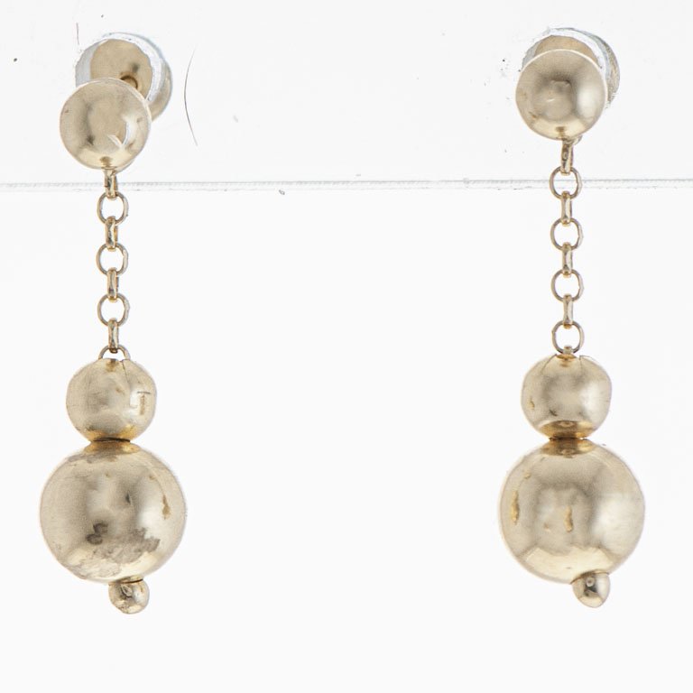 Lote anterior: Par de caravanas de oro 18k