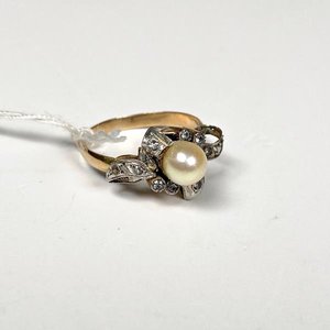 Lote anterior: Anillo de Oro con Perla y Circones, Talle 16 mm