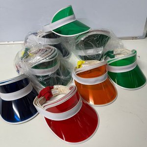 Lote siguiente: Lote de 48 Visores Transparentes de Colores para Sol