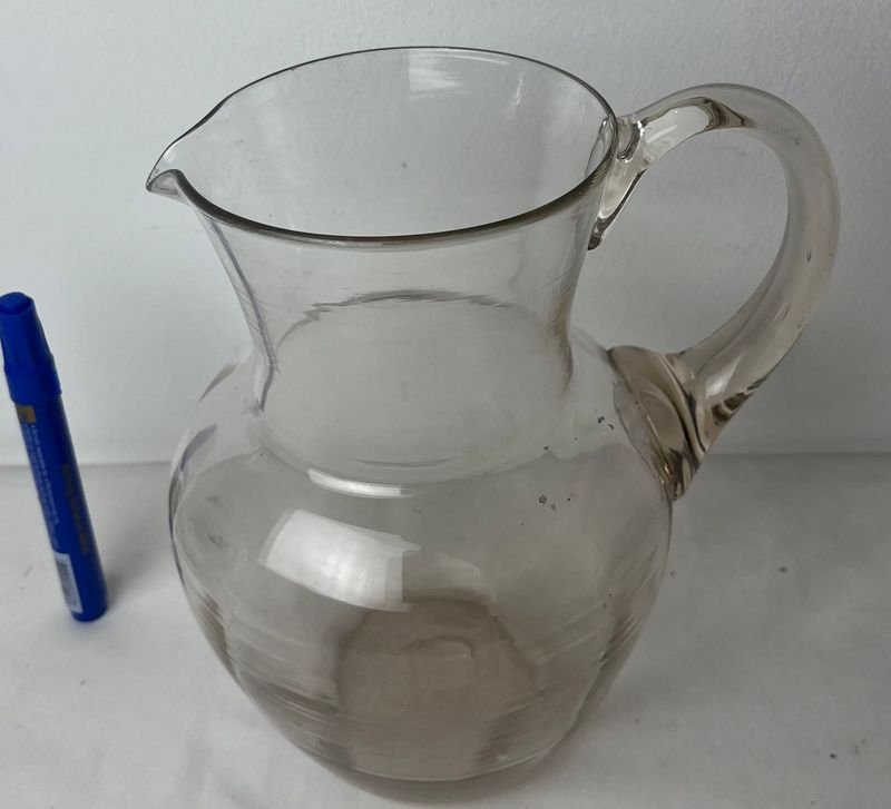 Lote anterior: Jarra de vidrio transparente con asa y tapa