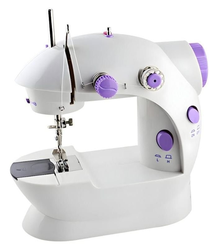 Lote anterior: Máquina de coser con botones morados y aguja plateada