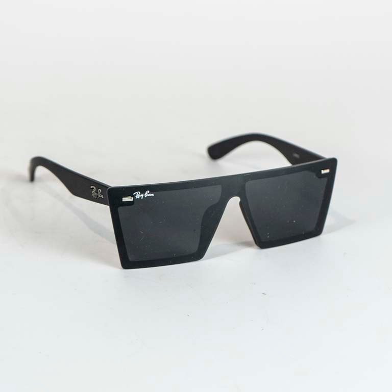 Lote siguiente: Lentes de sol Ray-Ban negras con logo plateado