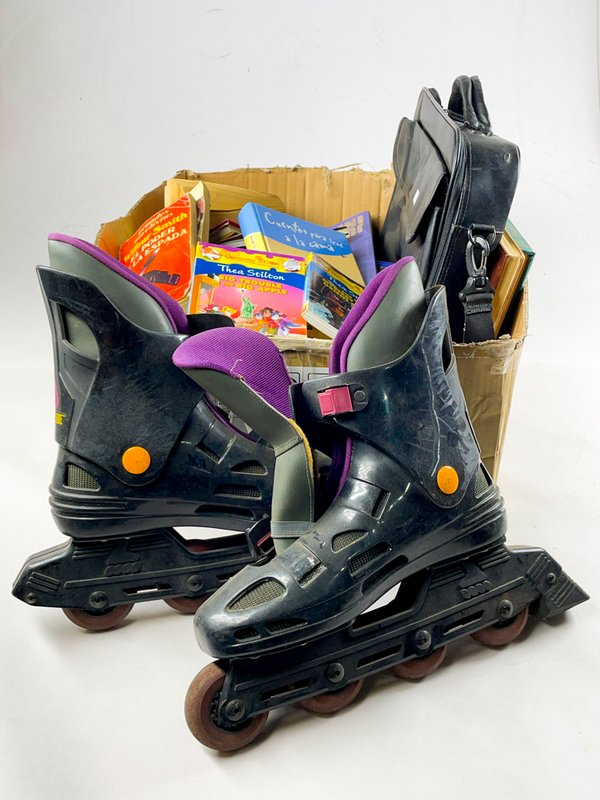 Lote anterior: Colección de patines, portafolio y libros en buen estado