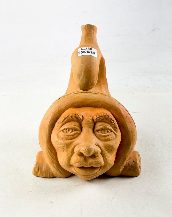 Jarra de cerámica artesanal con rostro humano - imagen 1