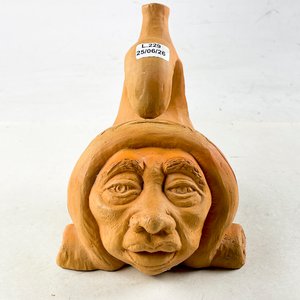 Lote siguiente: Jarra de cerámica artesanal con rostro humano