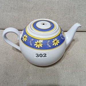 Lote anterior: Tetera Decorada con Flores Azules y Amarillas