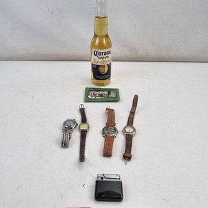 Lote siguiente: Lote de Relojes de Pulsera y Encendedor Zippo con Galgo