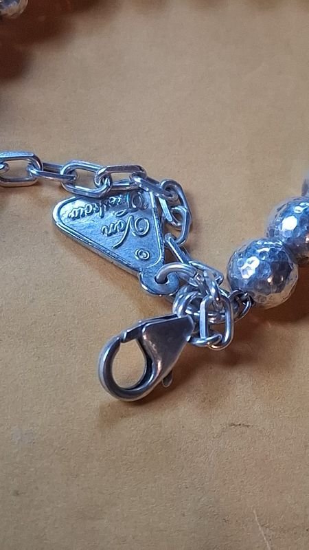 Pulsera de plata con detalles artesanales - imagen 2