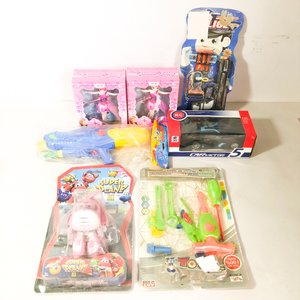 Lote de Juguetes: Muñecas, Auto RC, Pistola de Agua, Herramientas y Avión - imagen 2