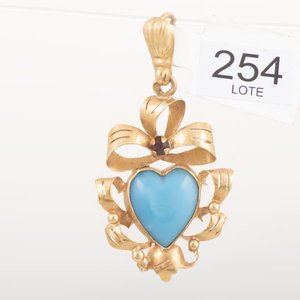 Lote anterior: Dije Corazón de Oro 18k con Piedra Celeste y Detalles Florales