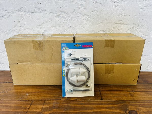 Lote #013 – Cuatro cajas de Kit de sujetadores para cortinas, cada caja contiene cinco kit