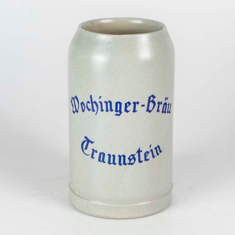 Lote siguiente: Jarra de cerveza Wochinger Brau en Traunstein Alemania