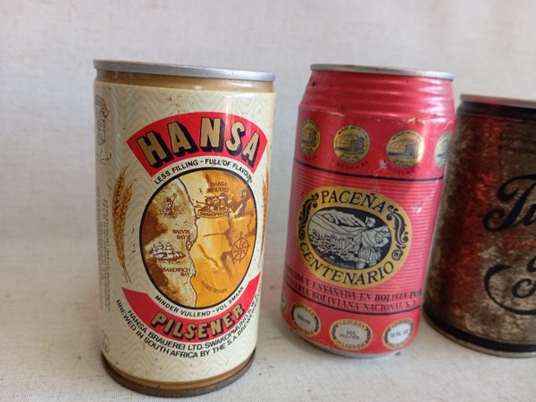 Colección de latas de diferentes colores y materiales - imagen 6