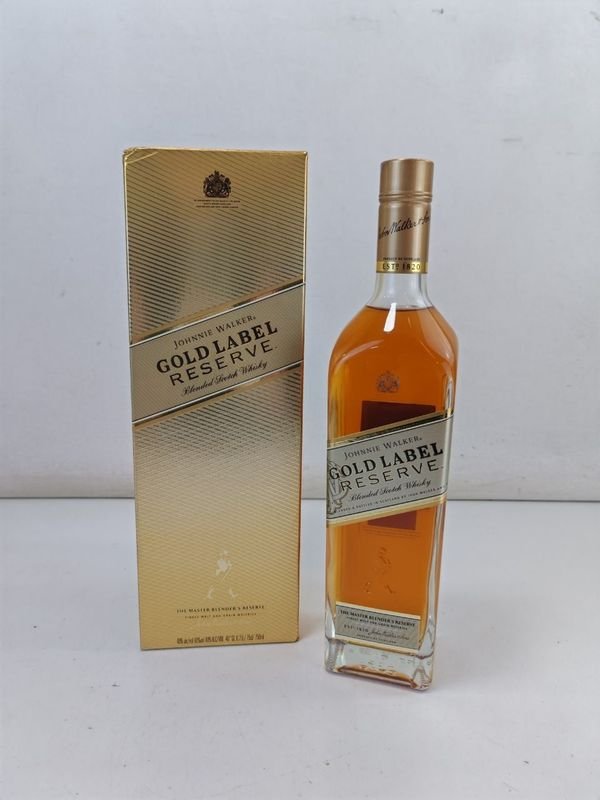 Lote siguiente: Botella de Whisky Johnnie Walker 750ml con etiqueta dorada