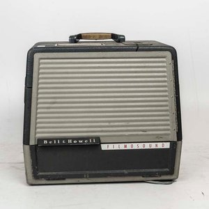 Lote anterior: Proyector de Películas Bell & Howell Filmosound Vintage