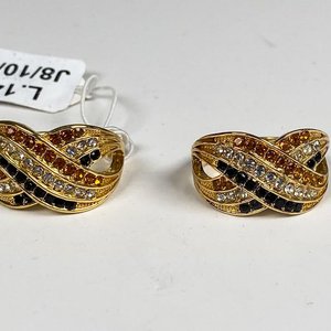 Lote siguiente: Dos Anillos Fantasía Dorados con Piedras Multicolor